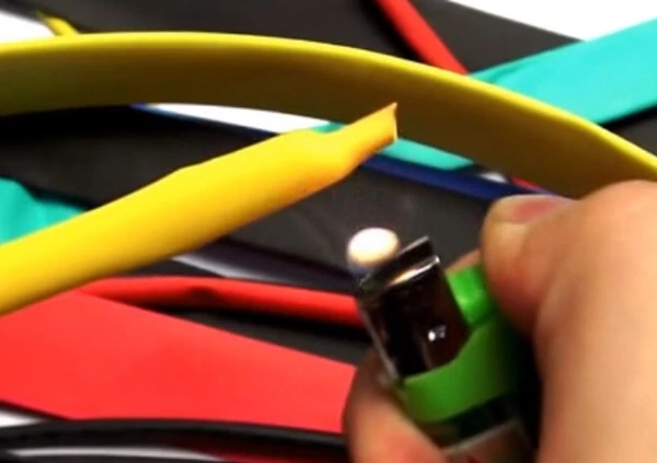 What can be used to heat heat shrink tubing?