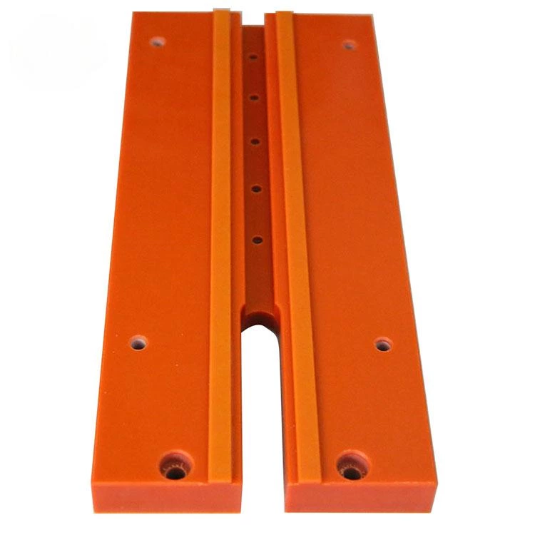 Dowe Precision Manufacturing of Orange Bakelite Insulation Components